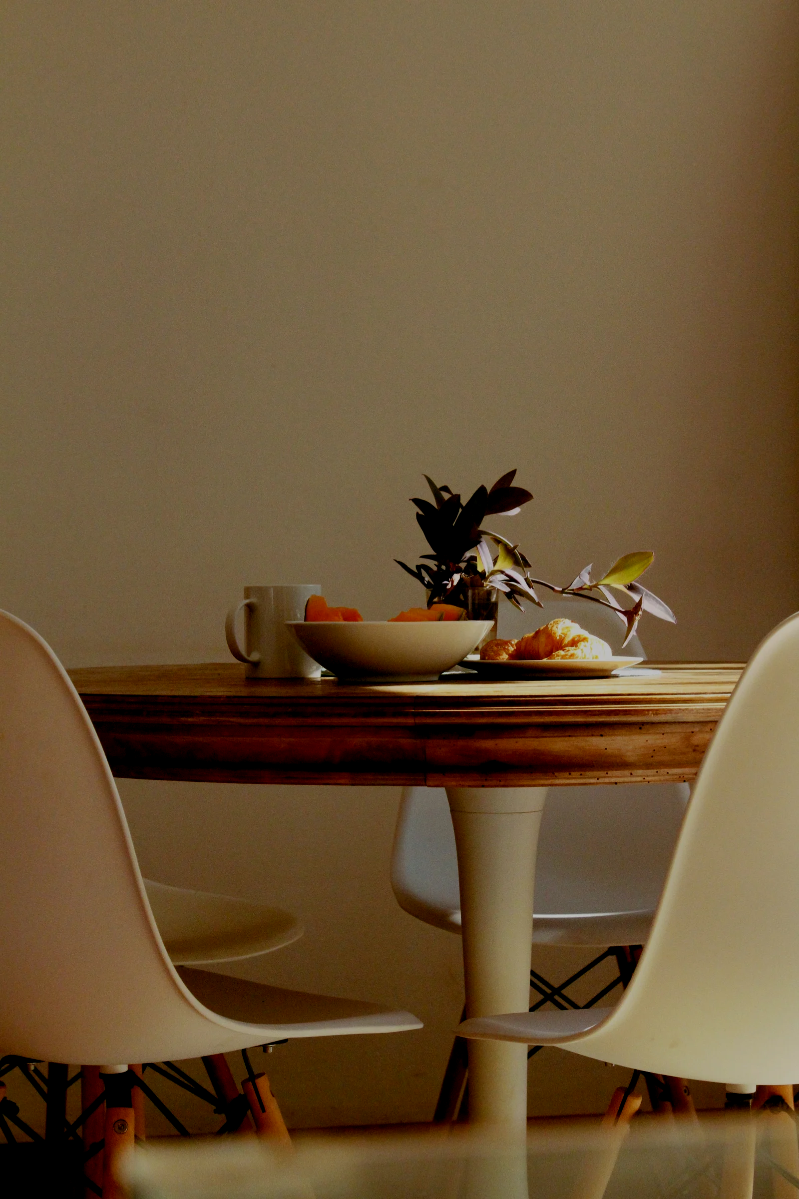 a table with a plate of food on it as a symbol of contact page of Inner pathways